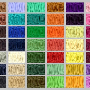 May include: A collection of 48 spools of thread in various colours, including shades of brown, blue, green, orange, yellow, purple, pink, and red. The spools are arranged in rows and columns on a grey background.