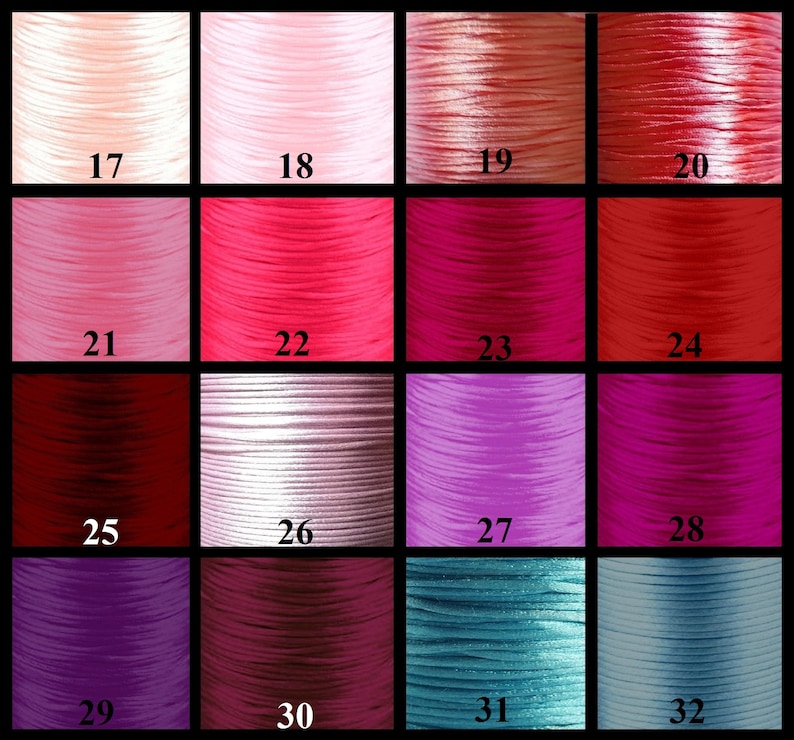 May include: A colour chart of 16 different shades of cord, ranging from light pink to dark purple. The cords are numbered 17 through 32.