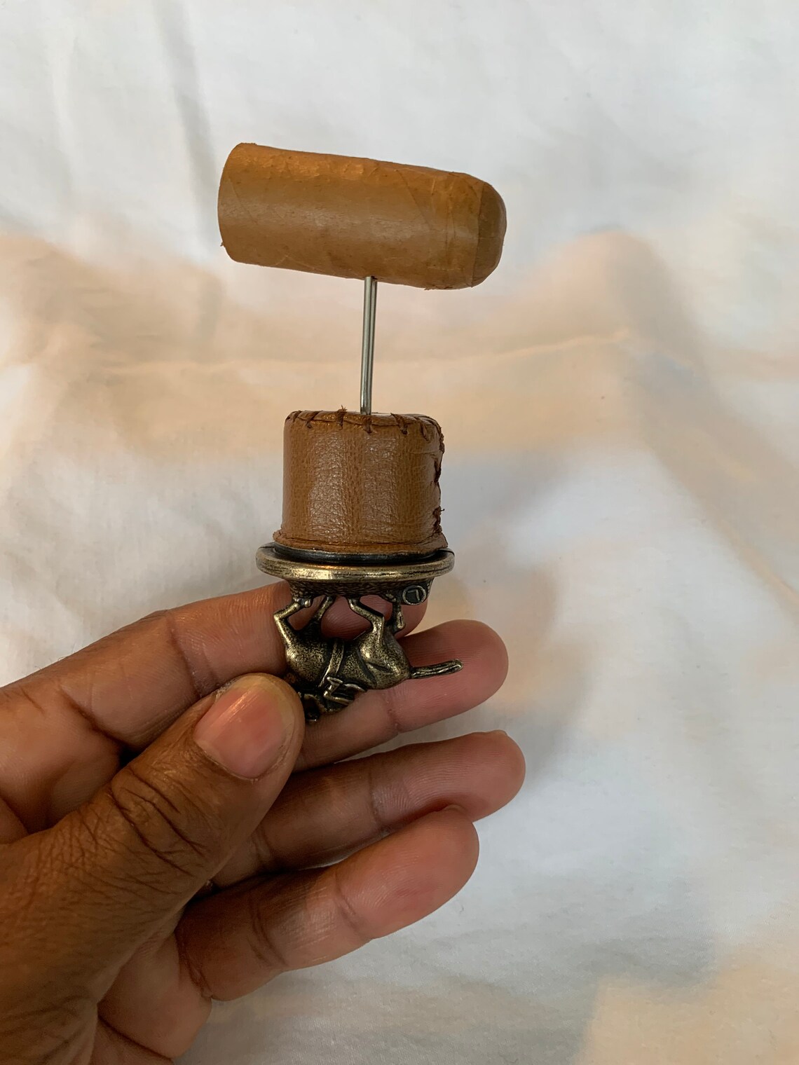 Yes it is a Blantons Cork turned into nubber Cigar Nubber Etsy