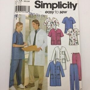 May include: Simplicity sewing pattern 9334, easy to sew, for making scrubs and a lab coat. The pattern includes five different styles: a short-sleeved scrub top, a long-sleeved scrub top, a lab coat, a pair of scrub trousers, and a pair of trousers.