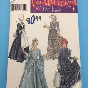 May include: A Simplicity sewing pattern for children's costumes. The pattern includes four different costumes: a colonial dress, a pioneer dress, a milkmaid dress, and a pilgrim dress. The pattern is for sizes S, M, and L.
