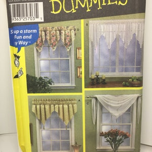 May include: A sewing pattern for window treatments, titled "Sewing Patterns for Dummies". The pattern includes three different styles of window valances: a floral print valance, a scalloped valance, and a swag valance. The pattern is for size 164, which is "alla sola/une seule taille".