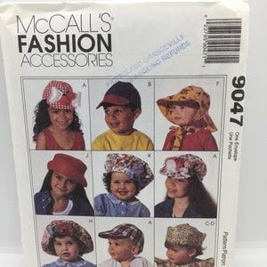 May include: A sewing pattern for children's hats. The pattern includes a variety of styles, including a baseball cap, a sun hat, and a beret. The pattern is for McCall's Fashion Accessories, pattern number 9047.