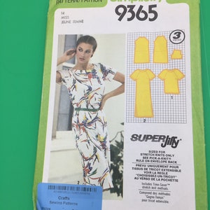 May include: Simplicity sewing pattern number 9365 for a miss's dress. The pattern is for stretch knit fabric and includes three pieces. The pattern is yellow and white with a black and white illustration of a woman wearing a white dress with a colourful abstract pattern.