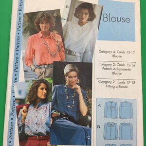 May include: A vintage sewing pattern for blouses. The pattern features images of women wearing different blouse styles. The word "Blouse" is displayed in a blue box. The pattern includes diagrams and instructions for making blouses.