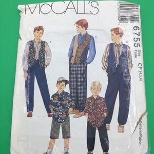 May include: A McCall's sewing pattern for boys' clothing, featuring four different outfits. The pattern is for sizes 4, 5, and 6. The pattern number is 6755.