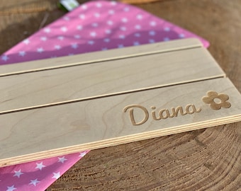Playing card holder with name and symbol