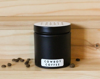 Cowboy Coffee | Soy Wax Candle | Essential Oils + Fragrance Oils | Smoked Cedar | Leather | Coffee Bean | Wooden Wick | Black Tin | 10oz