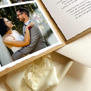 May include: A wedding invitation with a rustic brown paper background and a white paper insert with text that reads "For every smile, for the time and effort, for every helping hand, every loving word and for the wonderful gifts, we would like to thank you. Our wedding will always be one of the most beautiful days in our lives and without you, we would not have had this."