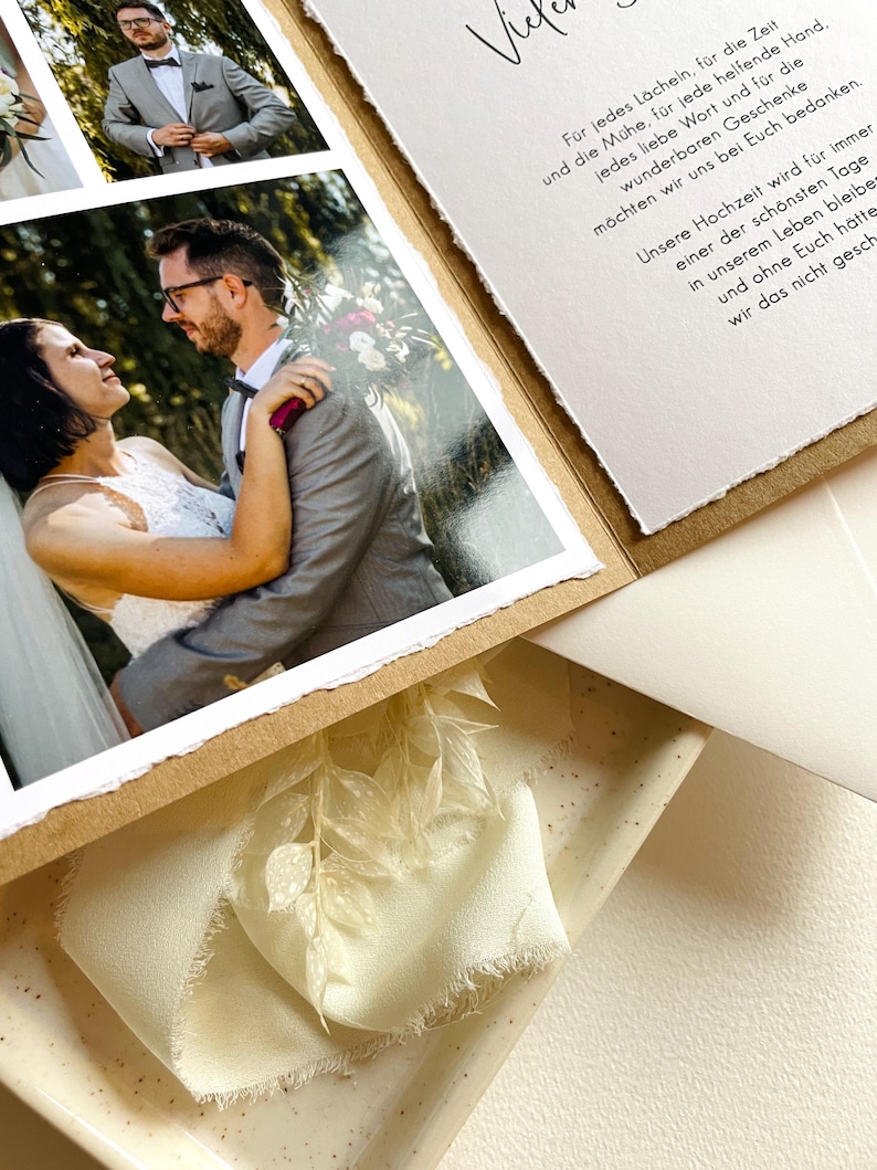 May include: A wedding invitation with a rustic brown paper background and a white paper insert with text that reads "For every smile, for the time and effort, for every helping hand, every loving word and for the wonderful gifts, we would like to thank you. Our wedding will always be one of the most beautiful days in our lives and without you, we would not have had this."