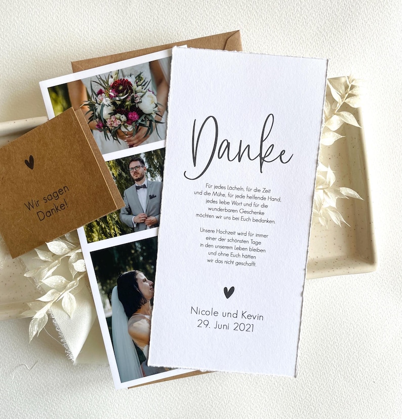 May include: A thank you card with a simple black and white design. The card features the word "Danke" in a cursive font and a message of gratitude for the time, effort, and gifts received. The card is signed "Nicole and Kevin" and the date "29. Juni 2021".