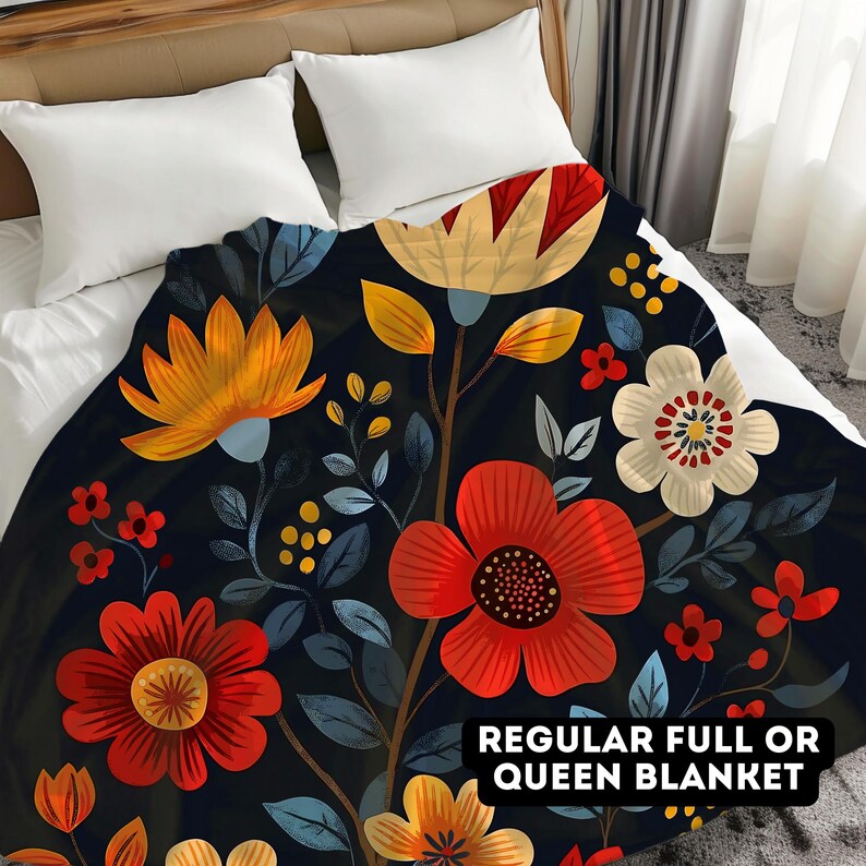 May include: A floral patterned blanket with red, yellow, and white flowers on a dark blue background. The text "REGULAR FULL OR QUEEN BLANKET" is printed on the blanket.
