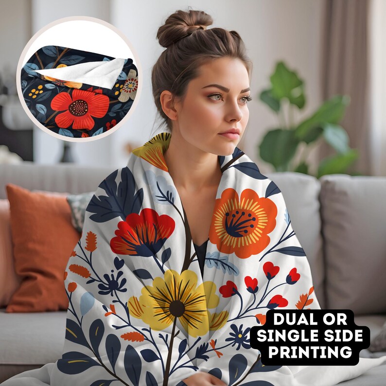 May include: A woman wearing a white, blue, and orange floral patterned throw blanket. The blanket has a dual or single side printing option.