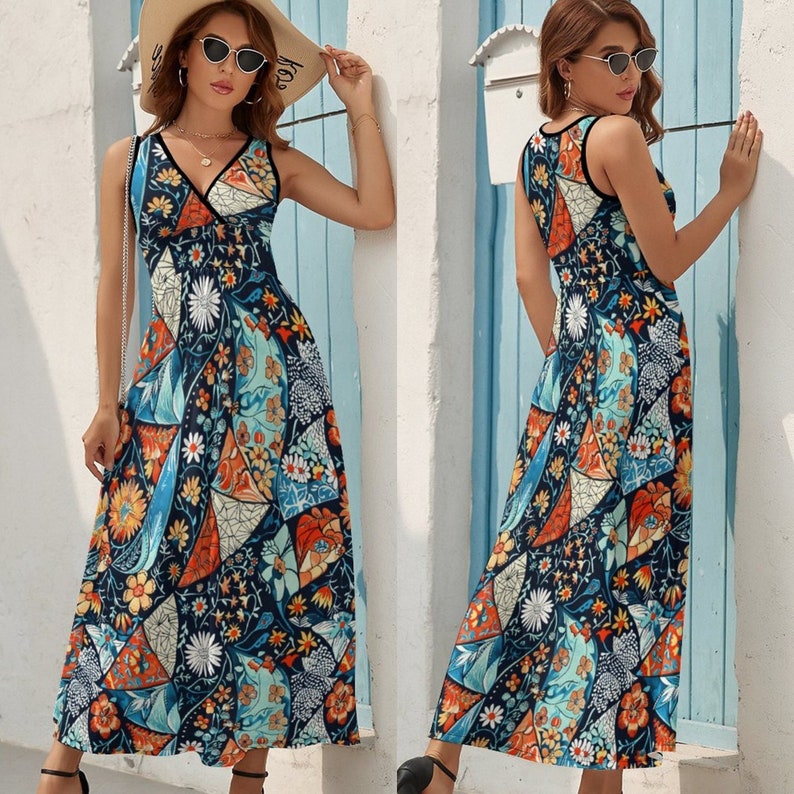 May include: A sleeveless maxi dress with a V-neckline and a colorful geometric and floral print. The dress has a fitted bodice and a flowing skirt.