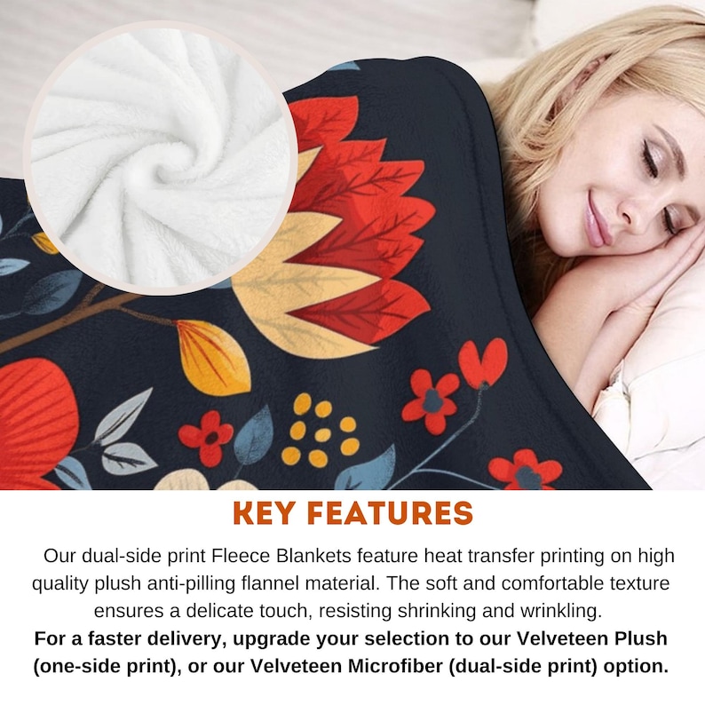 May include: A soft, plush fleece blanket with a floral pattern in shades of red, yellow, and blue on a dark blue background. The blanket is shown folded and draped over a bed with a person sleeping on it. The text "KEY FEATURES" is visible at the bottom of the image.