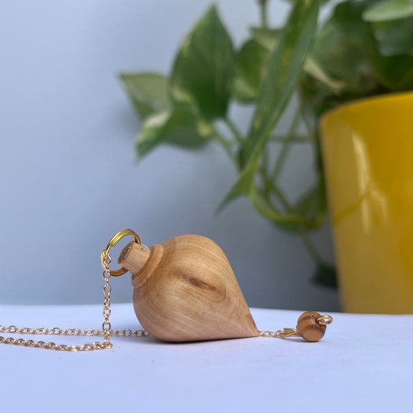 Pendule de radiesthésie en bois d' Olivier fait main, vendu avec sa boite et son sachet de transport