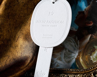 Custom White Clothing Hang Tags Swing Tag Thick Paper Hangtag Oval Hang Tags Embossed Price Tags Layered Hang Tags White Simple Tags