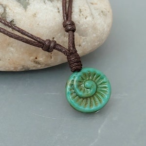 Ammonite Fossil Pendant in Turquoise Green - Brown or Black Cord Necklace - Made in Cornwall - Cornish Jewellery