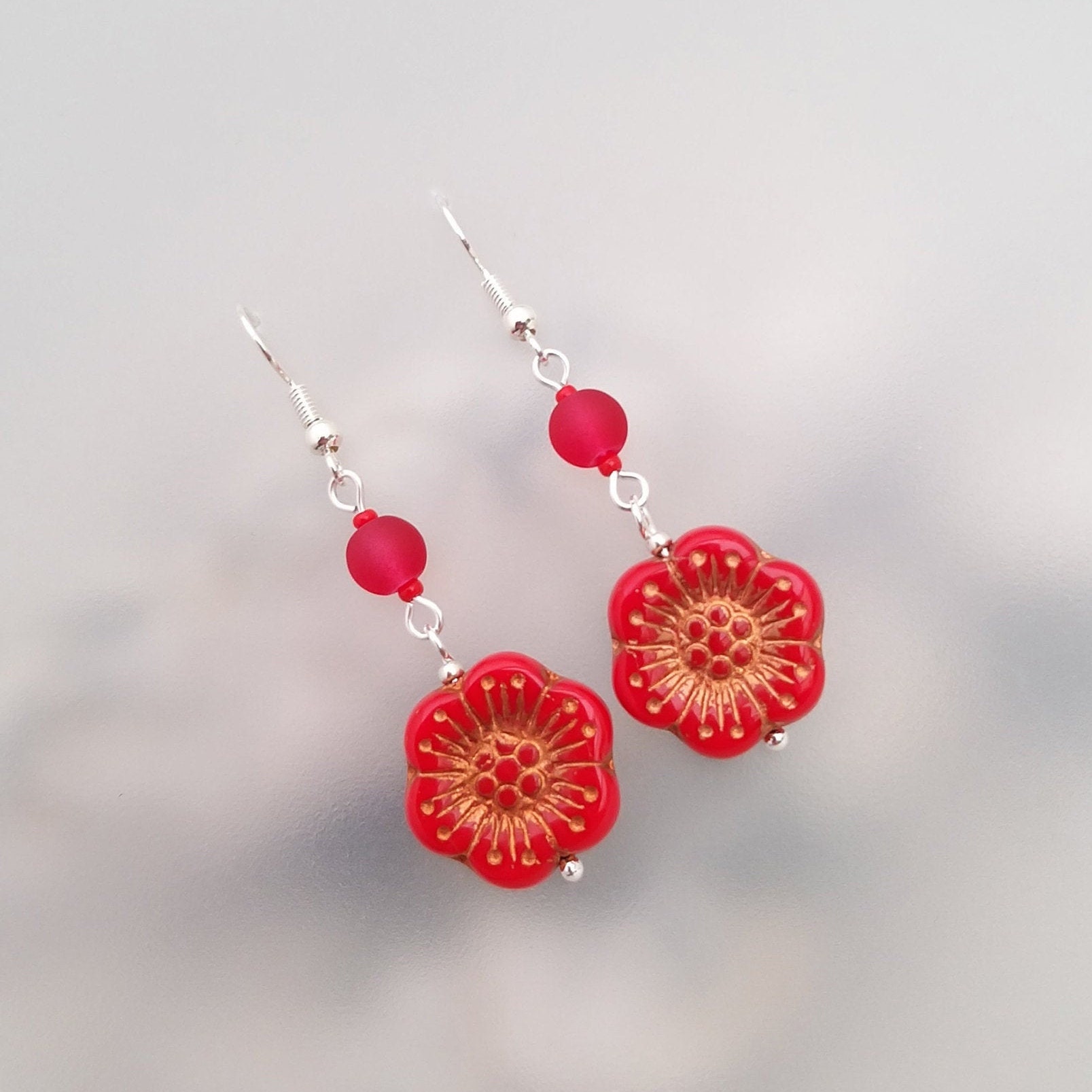 red floral earrings