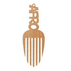 May include: A wooden Afro pick with the word "AFRO" cut out at the top. The pick has a rounded handle with a hole for hanging and vertical tines. The wood has a light brown color.