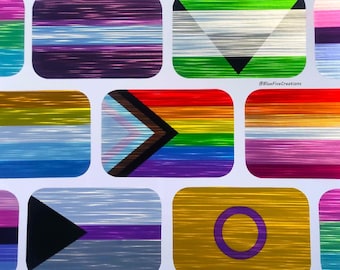 May include: A collection of rectangular designs featuring various LGBTQ+ pride flags. The flags display a range of colors, including rainbow, pink, blue, green, and yellow. The image includes the text "@BlueFiveCreations".