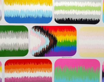 May include: A set of colorful stickers featuring different pride flags with a wavy, textured design. The flags include the transgender, bisexual, lesbian, gay, pansexual, and asexual pride flags.