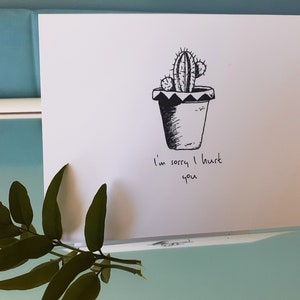 Cartão desenhado à mão - sinto muito por ter machucado você. Em branco por dentro