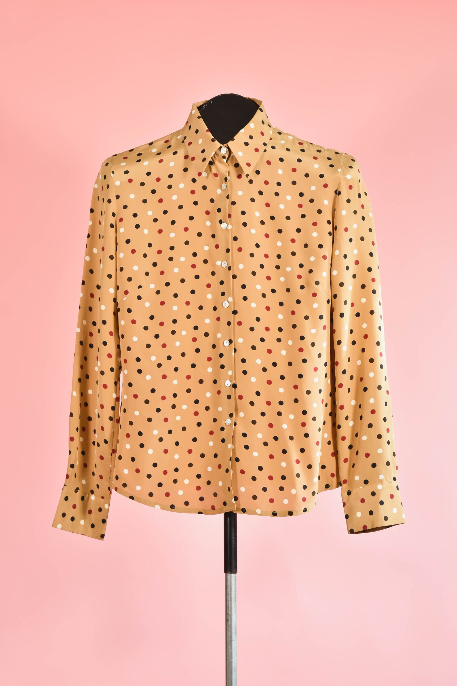 beige polka dot blouse