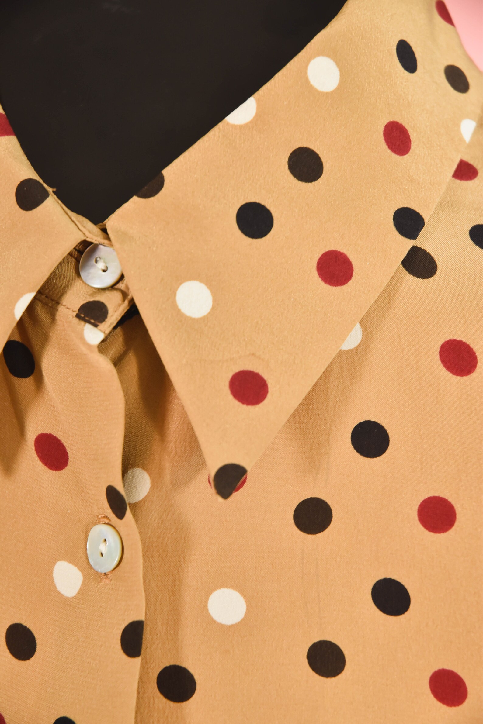beige polka dot blouse