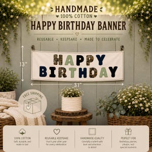 May include: A cream-colored cotton Happy Birthday banner with dark blue and camouflage-patterned fabric letters. The banner measures 13 inches by 31 inches. Text on the banner reads: HANDMADE 100% COTTON HAPPY BIRTHDAY BANNER REUSABLE KEEPSAKE.
