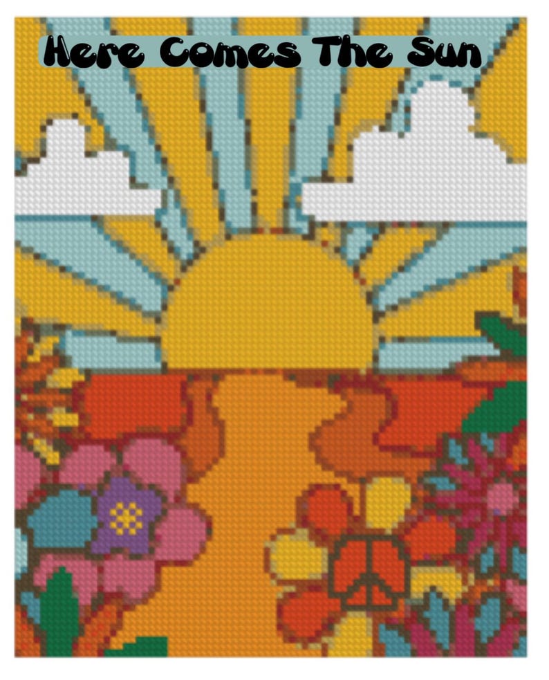 May include: A cross-stitch design with a retro theme. It depicts a yellow sun, blue sky, and white clouds, with the text "Here Comes The Sun" above. The lower section features flowers in orange, red, pink, and purple.