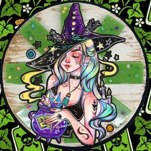 May include: A circular display featuring a central illustration of a figure wearing a purple witch hat with moon phases, holding a purple cauldron filled with crystals and tarot cards, surrounded by six green rectangular wax melt bars.