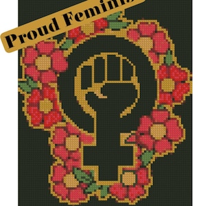 May include: A cross-stitch design featuring the feminist symbol, a raised fist within a female symbol, surrounded by red flowers with yellow centres and green leaves. The words "Proud Feminist" are displayed on a gold banner.