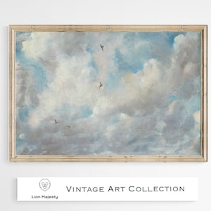 May include: A framed painting of a cloudy sky with birds flying in formation. The painting is in a light wood frame and has a vintage aesthetic.