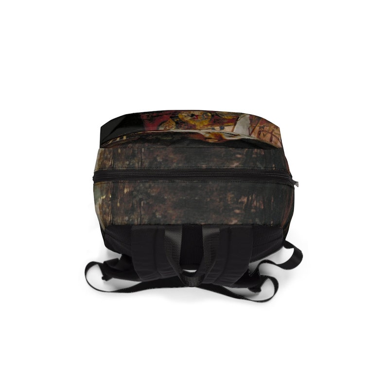 May include: A black backpack with adjustable straps. The backpack has a dark brown, textured pattern with a colorful design on the front.