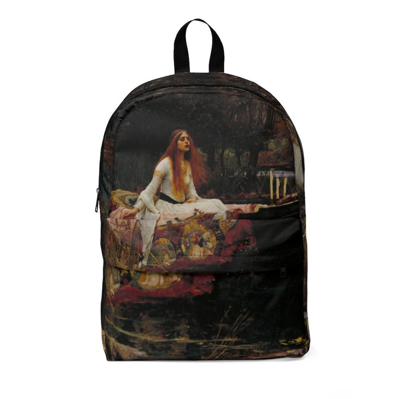 May include: A black backpack with a print of a painting depicting a woman in a white dress sitting on a bed with a red and gold tapestry. The woman has long red hair and is looking to the left. The background is a dark forest.