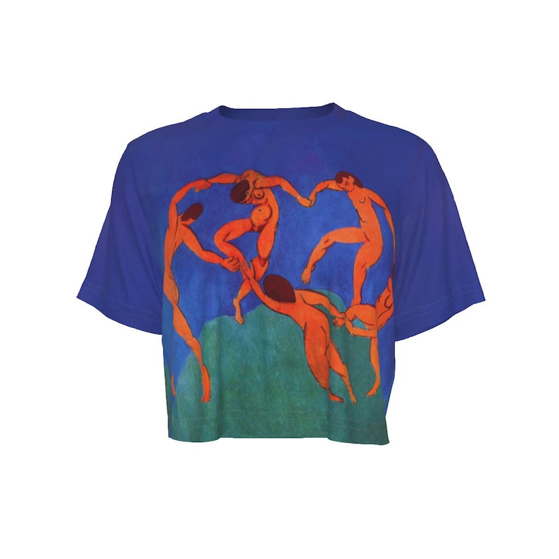 May include: A blue crop top with a print of a painting depicting dancing figures. The artwork shows orange figures against a blue and green backdrop. The figures are holding hands in a circle.