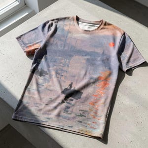 May include: A white ceramic mug with a black handle and the text "But First, Coffee" in a bold, black font. The mug is sitting on a wooden surface. The mug is approximately 4 inches tall.