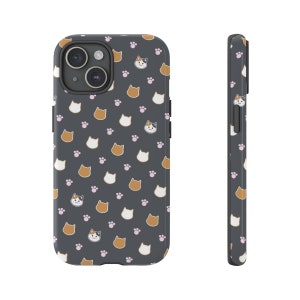 May include: A black phone case with a repeating pattern of pink paw prints and cartoon cats with brown, white, and orange fur.