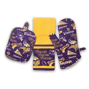 May include: A set of three kitchen items featuring the Minnesota Vikings logo. The set includes a purple and yellow oven mitt, a purple and yellow pot holder, and a purple and yellow kitchen towel. The items are all decorated with the Vikings logo and the words "Vikings" and "Minnesota".