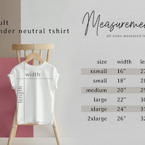 May include: A white, gender-neutral t-shirt displayed on a wooden hanger. The image includes size measurements in inches: xsmall (16" width, 27" length), small (18" width, 28" length), medium (20" width, 29" length), large (22" width, 30" length), xlarge (24" width, 31" length), and 2xlarge (26" width, 32" length).