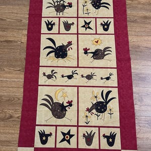 May include: A fabric panel featuring a repeating pattern of whimsical chickens in various poses, set against a tan background. The design includes stars, flowers, and crescent moons, framed by a burgundy border. The text "Do The Funky Chicken" is visible at the bottom.