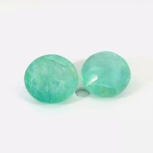 Par de piedras preciosas de grandidierita: 0,85 ct, corte redondo azul/verde, origen Madagascar