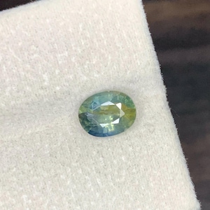 Natural bicolor  Sapphire Gemstone: 1.80  Carat Oval Cut, Madagascar