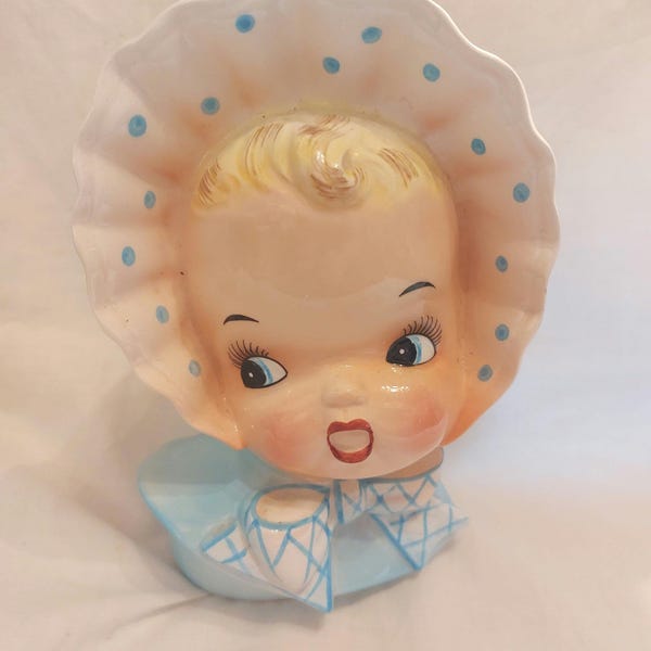 Ucagco lady head vase.  Offers welcome