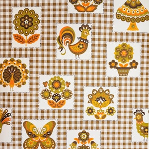 May include: Vintage fabric with a brown and white checkered pattern. The fabric features repeating square designs with floral, rooster, and butterfly motifs in shades of orange, brown, and green.
