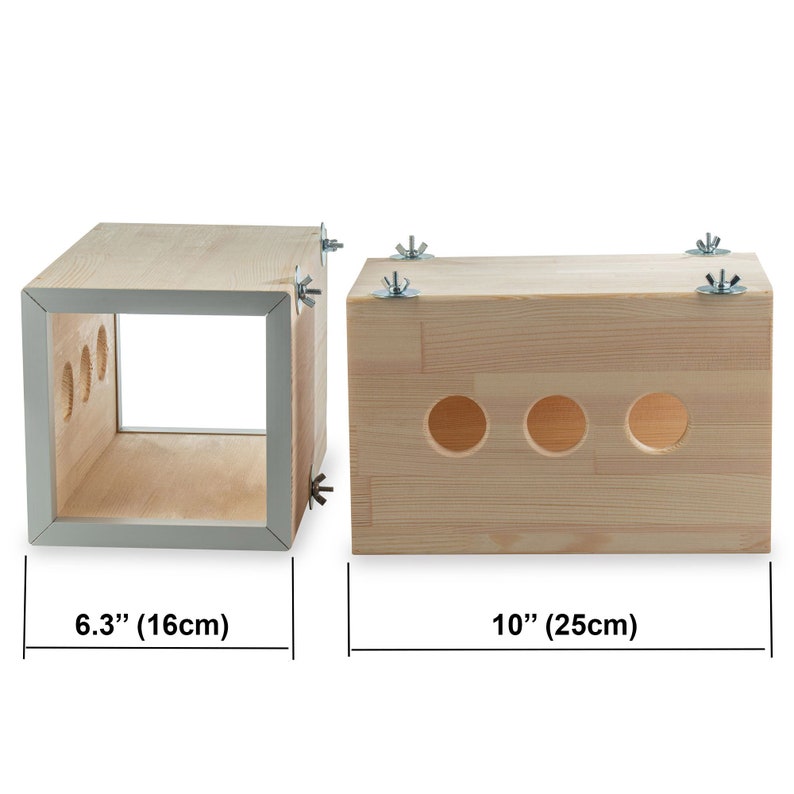 May include: Two wooden boxes with holes. The smaller box is 6.3 inches (16 cm) wide and the larger box is 10 inches (25 cm) wide.