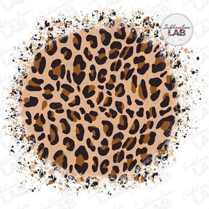 May include: A brown, black, and beige leopard print design with a white splatter effect around the edges.