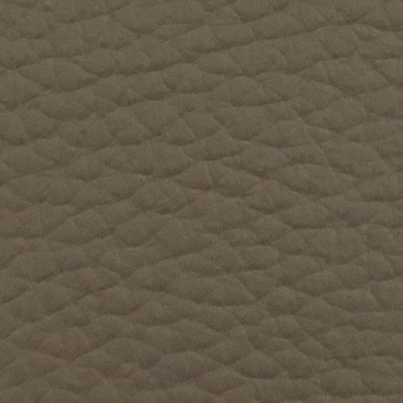 Contrail Film Camera - Close-up of fawn leather texture on restored Olympus Trip 35 film camera