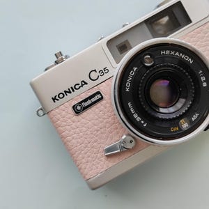 Konica C35 Rangefinder Film Camera | Refurbished & Tested in Japan | Kodak Film Included | Hexanon 38mm Lens | Pale Pink Leather image 7